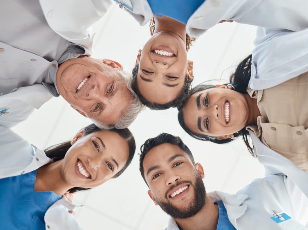 Natural health professionals in a huddle