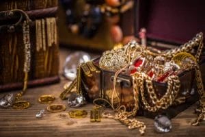 Open treasure chest with jewels